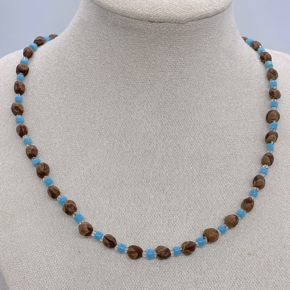 Vintage handmade necklace made of seeds